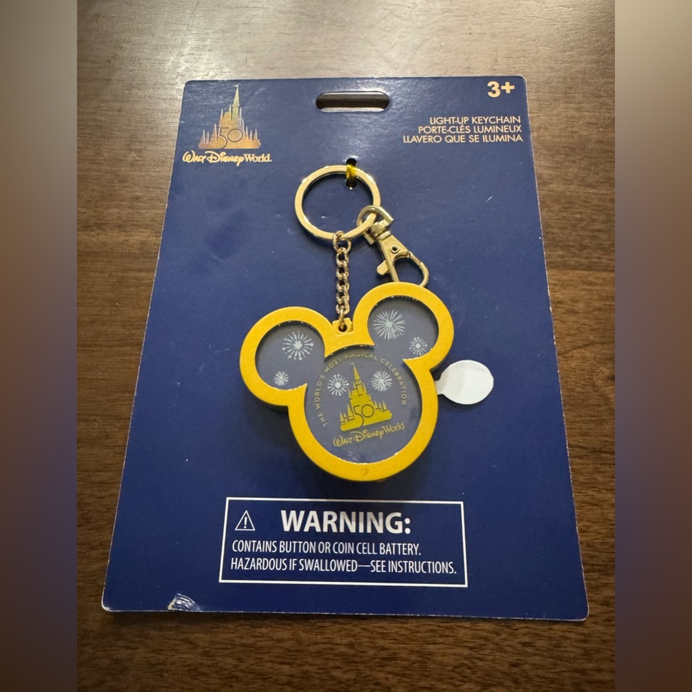 Walt Disney World 50th anniversary light up keychain.